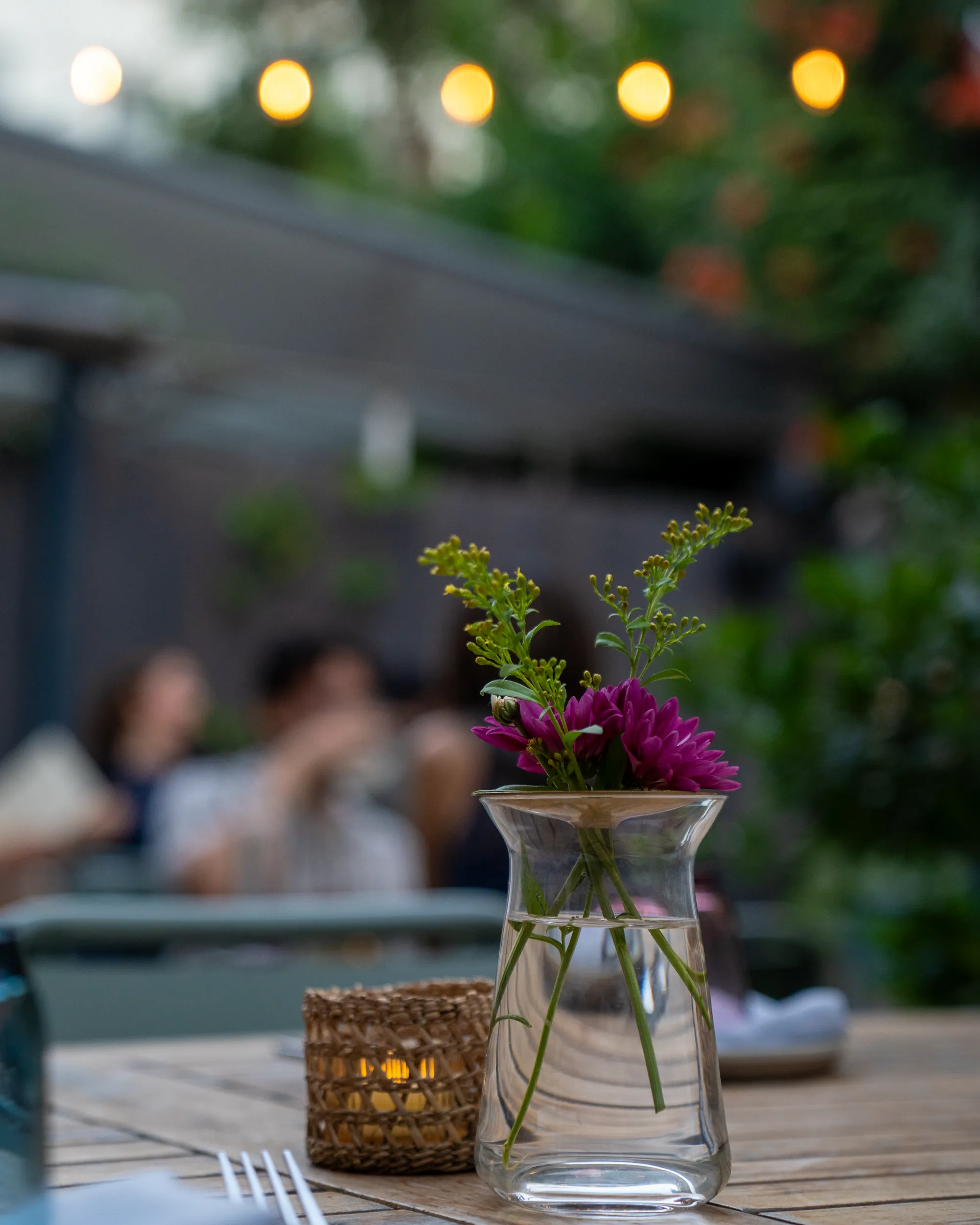 Flowers in a vase on a table in the Sawa garden